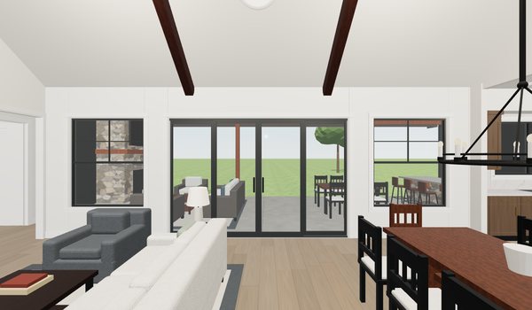 Living room with vaulted ceiling beams, sofa and sliding doors to the rear patio
